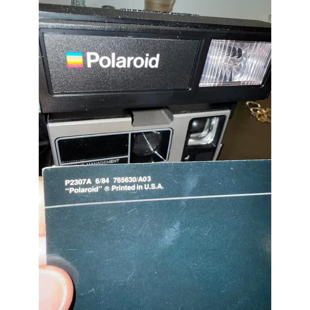 Vintage 1980's Polaroid Sun 600 LMS Light Instant Camera w original instructions